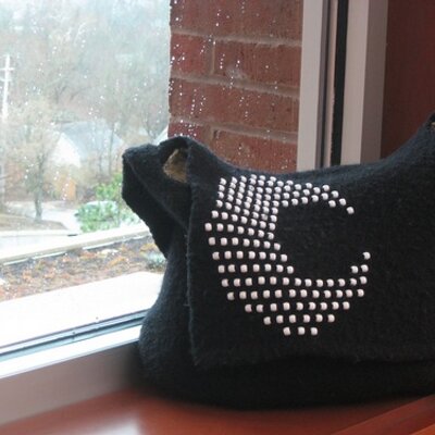 Profile Picture of Sarah Jo Burch (@MoonlitKnits) on Twitter