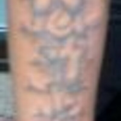 Profile Picture of Lorenzo Garrett (@Renzotattedup) on Twitter