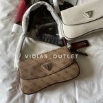 Profile Picture of СУМКИ GUESS, PINKO, JW PEI, COACH / ГОДИННИКИ MICHAEL KORS (@vidias_outlet_) on Instagram