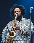 Profile Picture of Kamasi Washingtonon Wikipedia