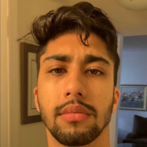 Profile Picture of Adrian Davis (@pupini) on Poshmark