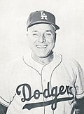 Profile Picture of Greg Mulleavyon Wikipedia