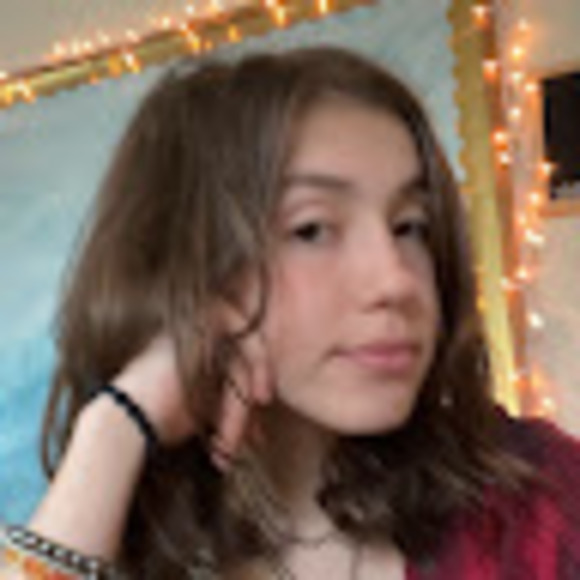 Profile Picture of Olivia James (@roaringfeather) on Poshmark