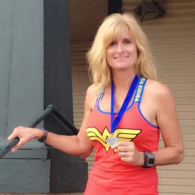 Profile Picture of Melanie Holland (@Goforarungirl) on Twitter