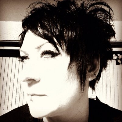 Profile Picture of Charity Francis (@FemmeBot75) on Twitter