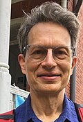 Profile Photo of Mark Hollmannon Wikipedia