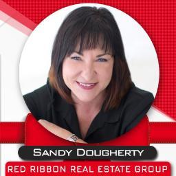 Profile Picture of Sandy Dougherty (@RedRibbonRE) on Twitter