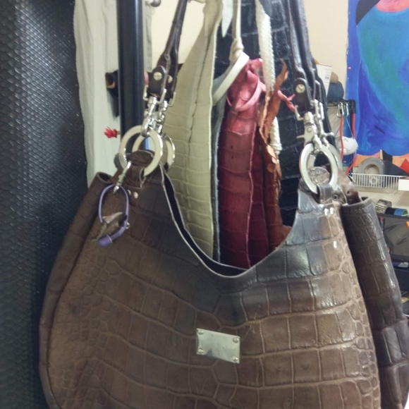 Profile Picture of Dennis Dotson (@paulandrubio) on Poshmark