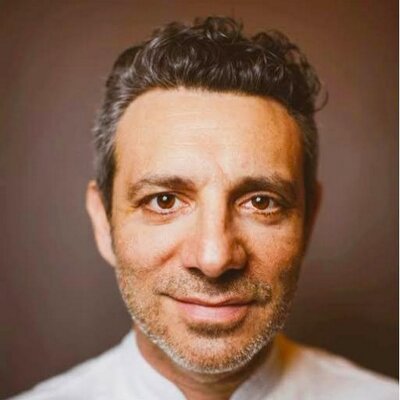 Profile Picture of John DeLucie (@ChefJohnDeLucie) on Twitter