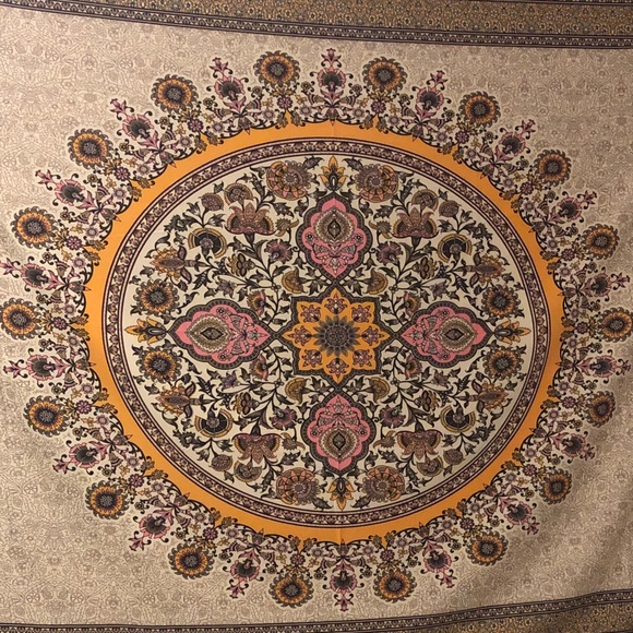 Profile Picture of Toni Triola (@sunchildthreads) on Poshmark