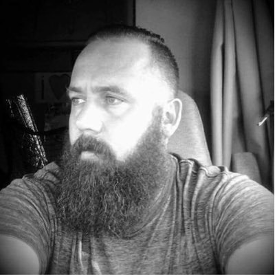 Profile Photo of Michael Clevenger (@beardedromper) on Twitter