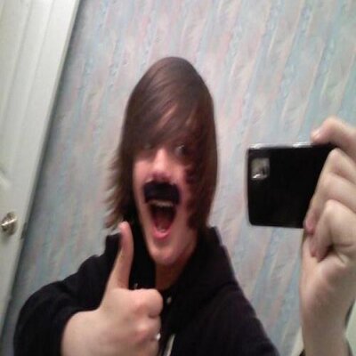 Profile Picture of Travis Ginn (@legitimateTrav) on Twitter