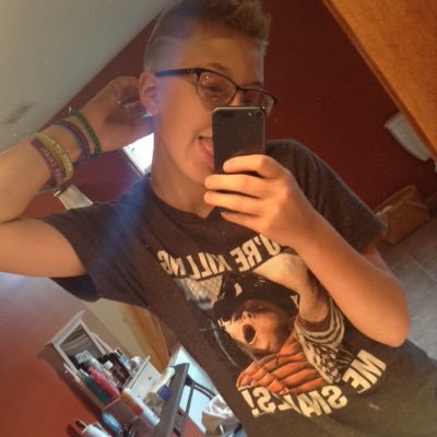 Profile Picture of Corey Slusser (@TallestMidgett) on Twitter