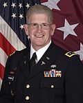 Profile Picture of Eric Schoomakeron Wikipedia
