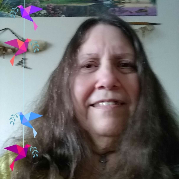 Profile Picture of Carla Foster (@tanzique) on Poshmark