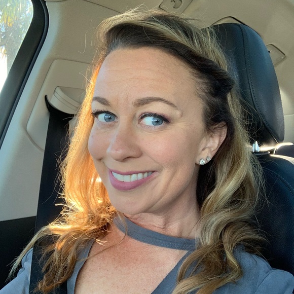 Profile Picture of Katie Stoupas (@nikosracing) on Poshmark