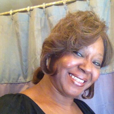 Profile Picture of Lizette Thomas-Moore (@MooreLizette) on Twitter