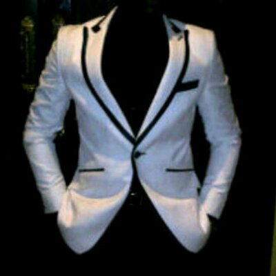 Profile Picture of Ashu Timothy Couture (@AshTimCouture) on Twitter