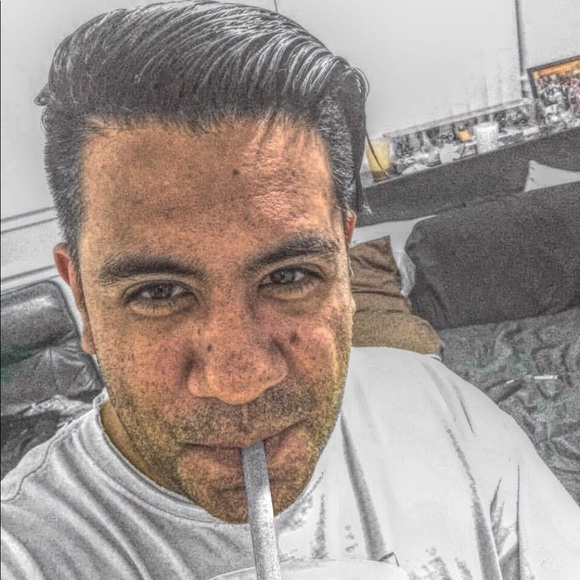 Profile Picture of John Downs (@johnnybronx0409) on Poshmark