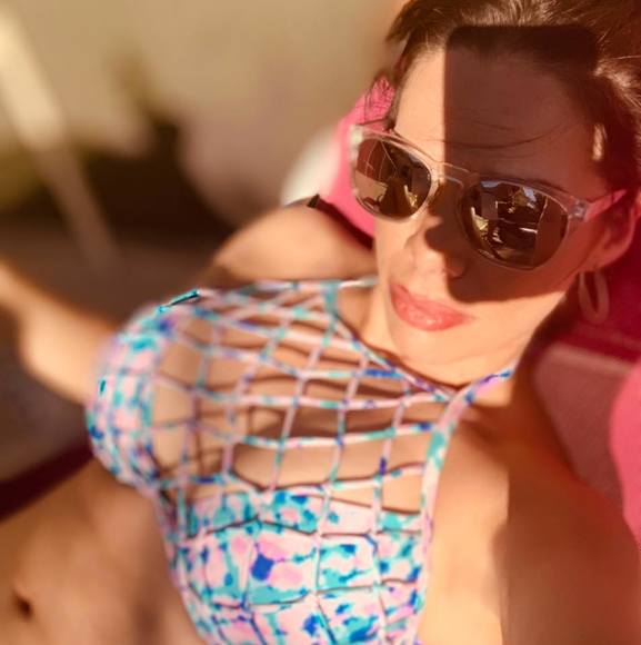 Profile Picture of Christina Carballo (@serene702) on Poshmark