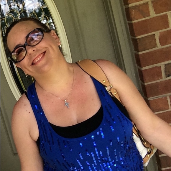 Profile Picture of Shannon Rainero (@raineros) on Poshmark