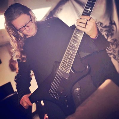 Profile Picture of Tim Aalbers (@8StringFling) on Twitter