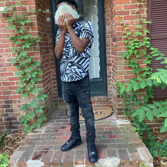 Profile Picture of John Woo (@john_woo) on Poshmark