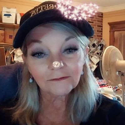 Profile Picture of Cheryl Kahler (@catzembroidery) on Twitter