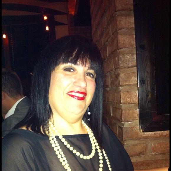 Profile Picture of Carmen Molinaris (@madamemoli) on Poshmark