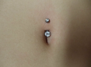 Profile Picture of Navel piercingon Wikipedia